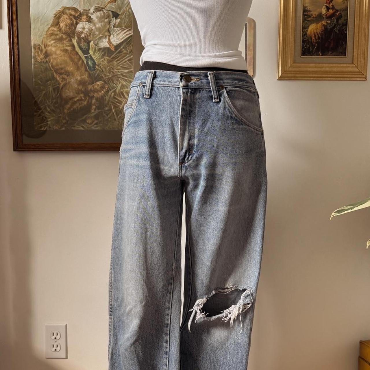 Distressed Wrangler blue jeans (32")