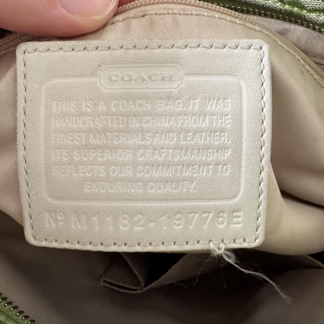 Green coach shoulder bag