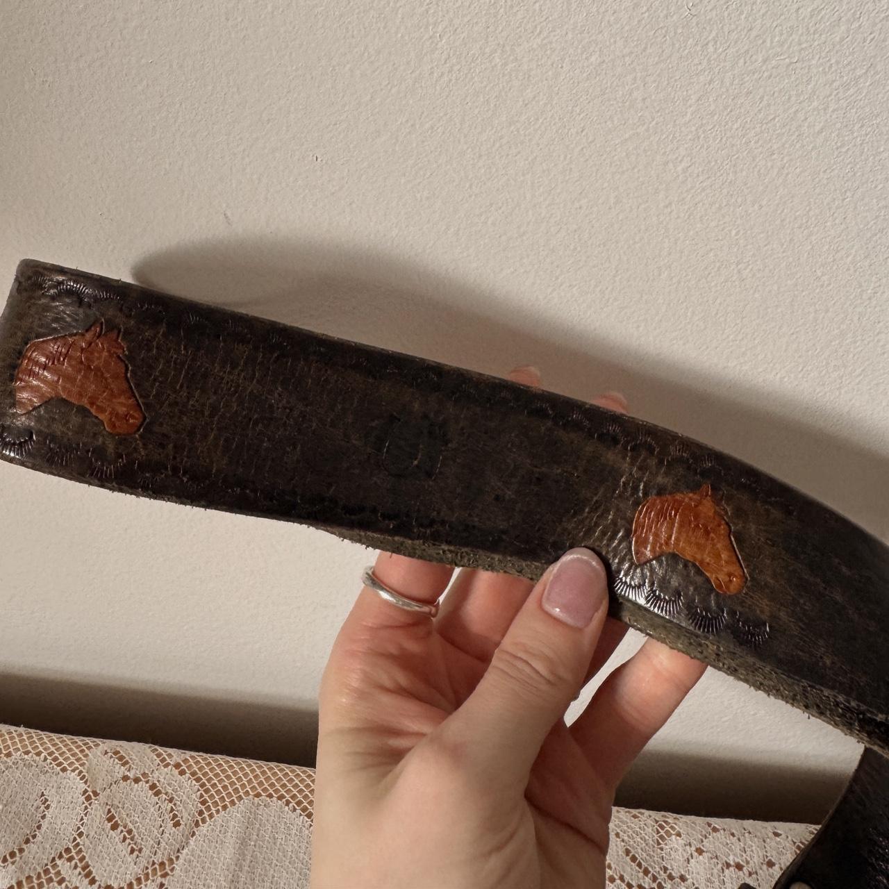 Brown leather horse pattern belt