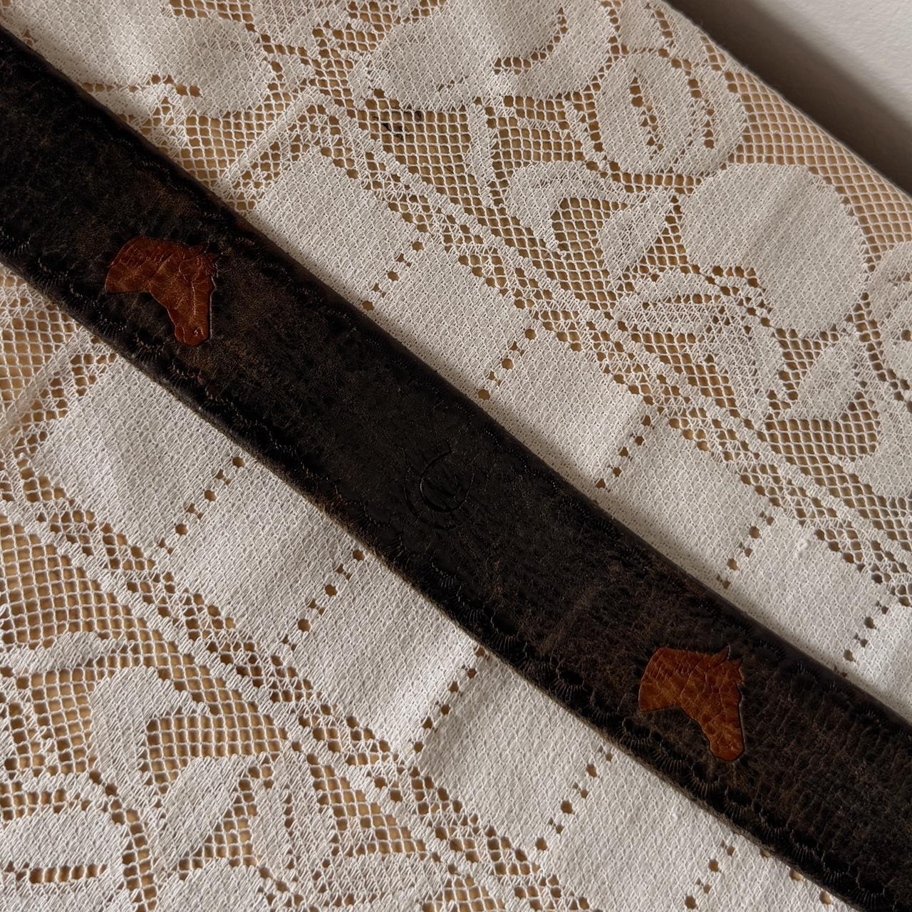 Brown leather horse pattern belt