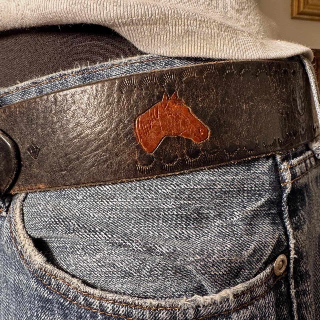 Brown leather horse pattern belt