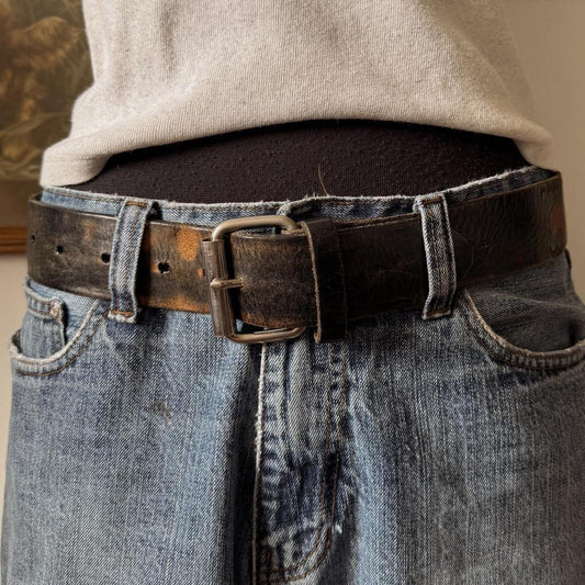 Brown leather horse pattern belt