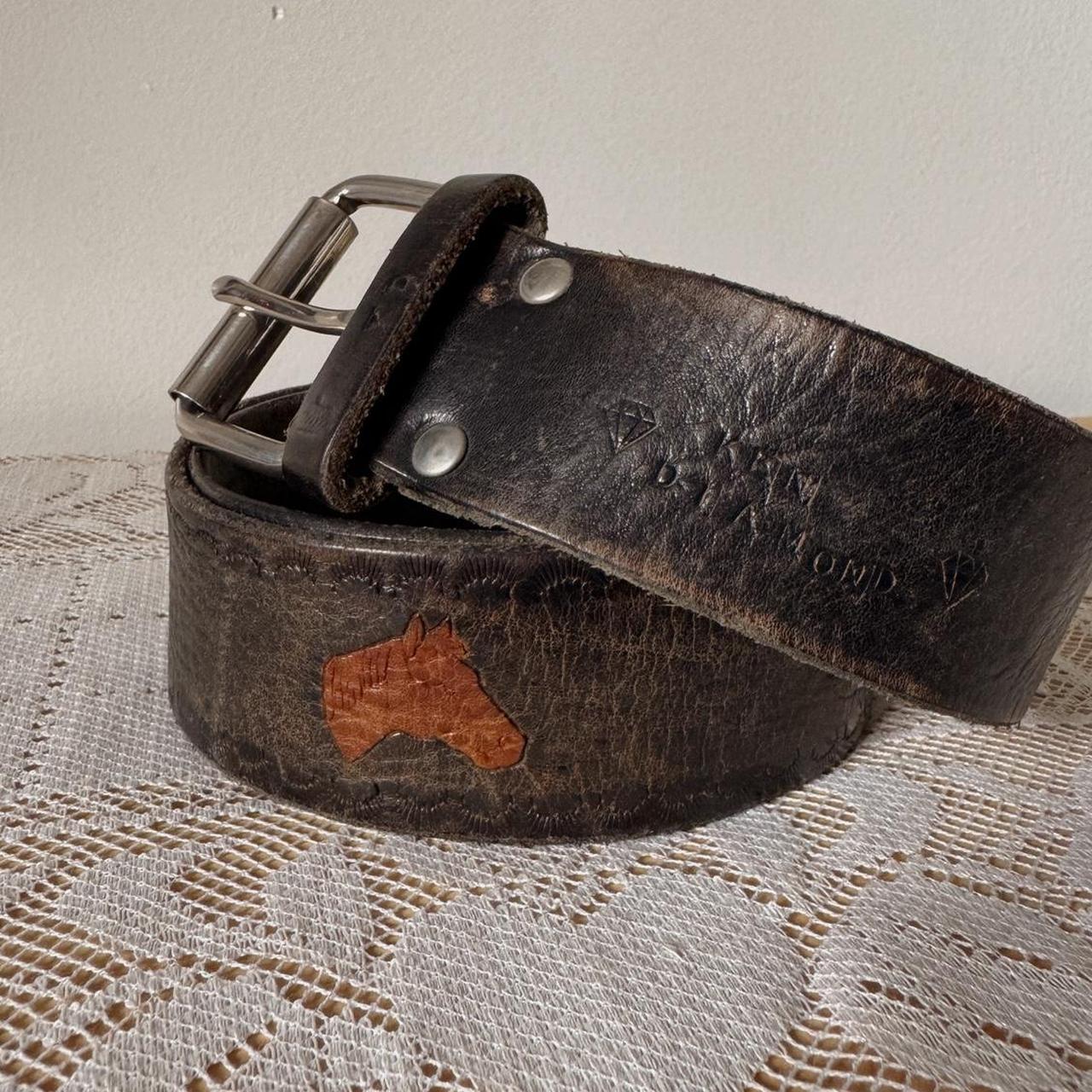 Brown leather horse pattern belt