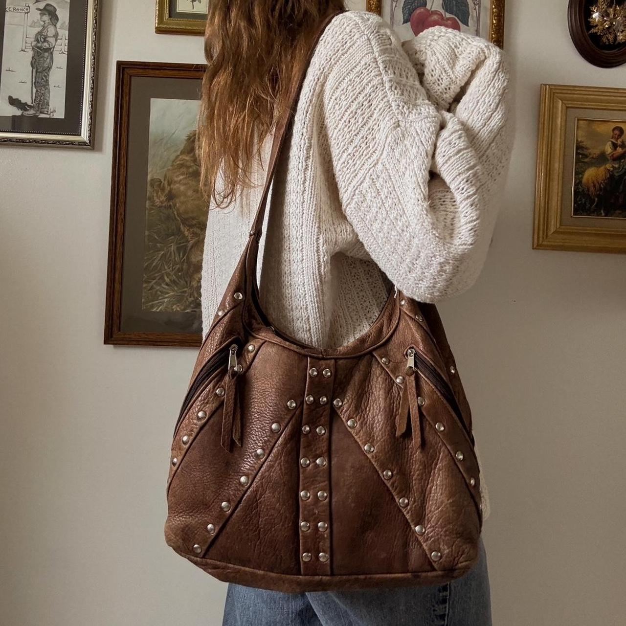 Leather studded slouch bag