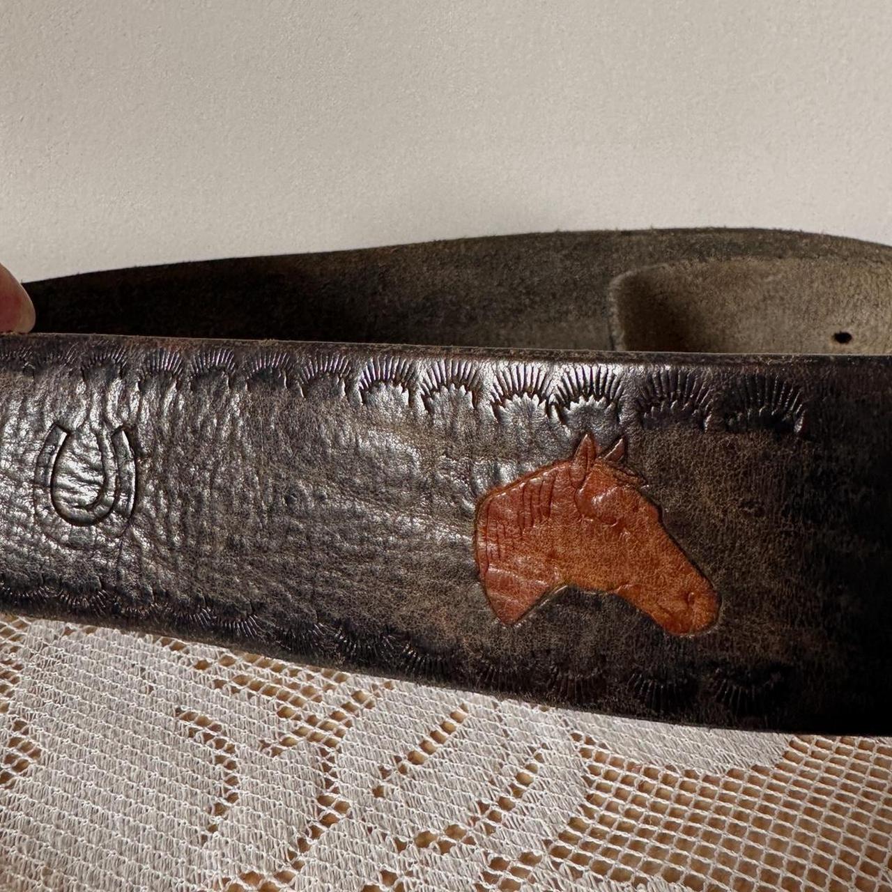 Brown leather horse pattern belt