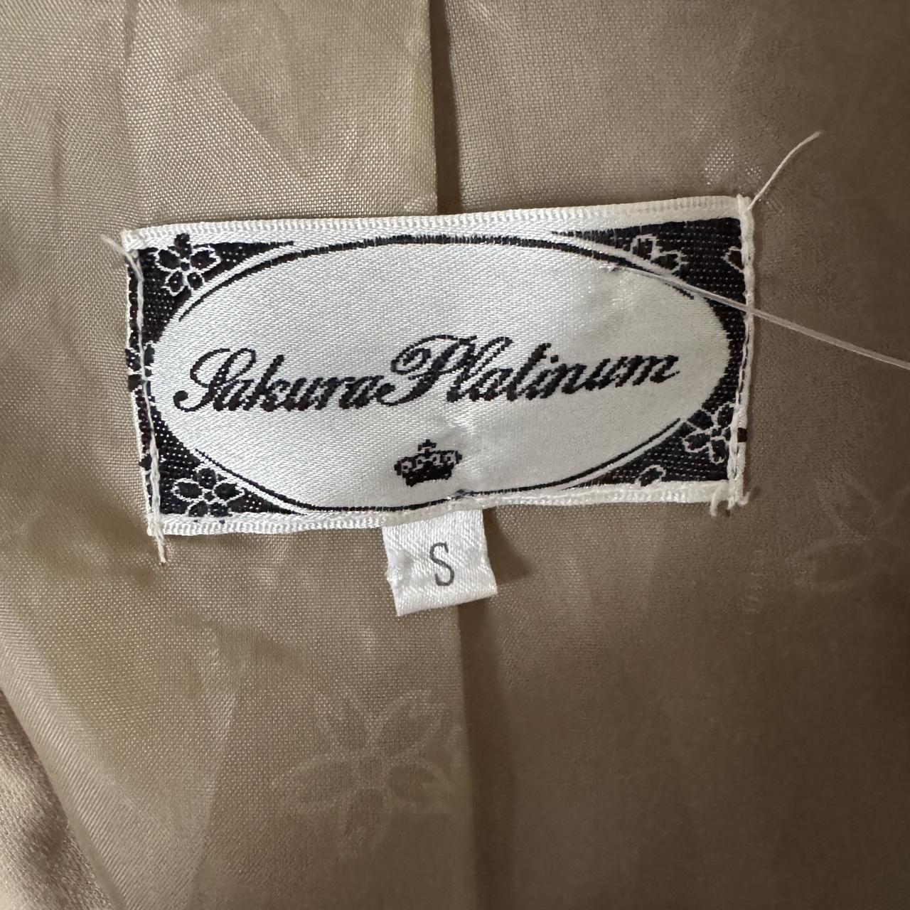 Tan belted trench coat (XS)