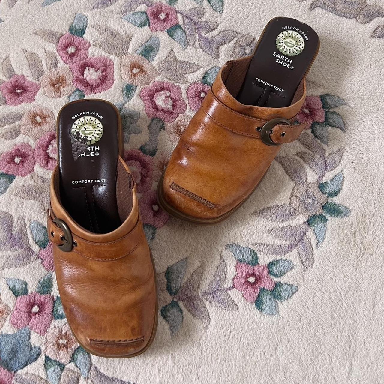 Tan buckle clogs (8)