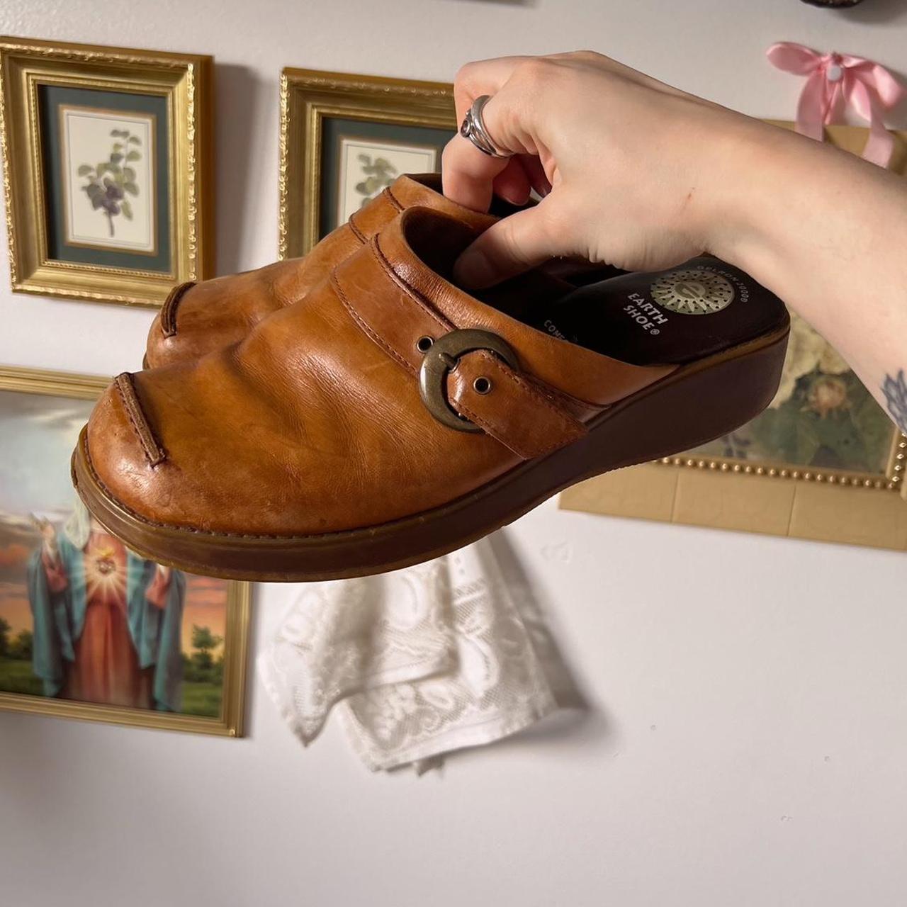 Tan buckle clogs (8)