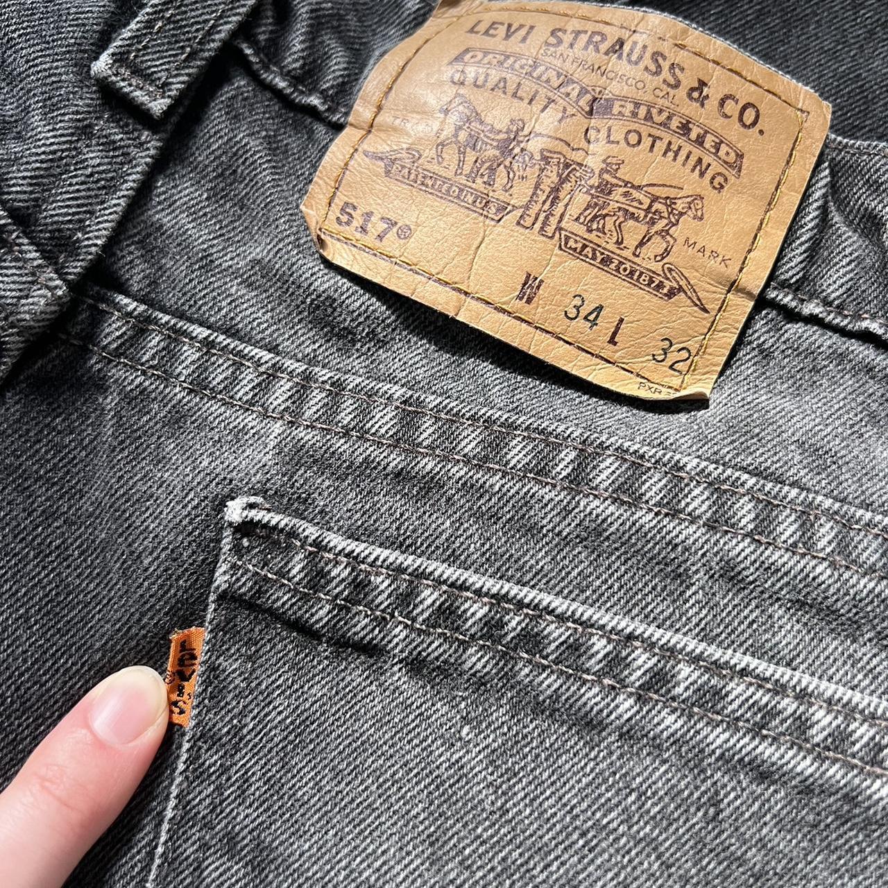 1997 orange tab Levi's (32")